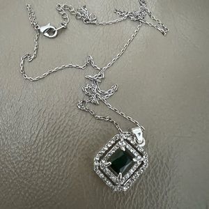 Silver tone emerald cut stone necklace